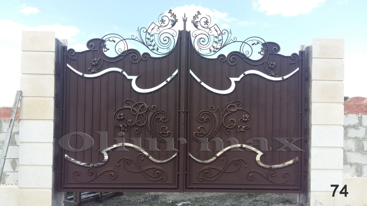 Balustrade, porți, copertine, garduri, gratii , uși metalice și alte confecții din fier forjat. imagine 3